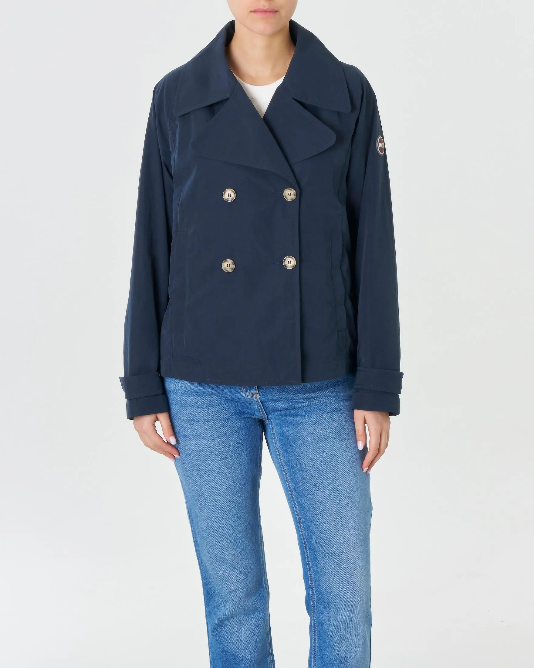 Giacca doppiopetto blu in tessuto froisse con scollo a rever e spacchetti